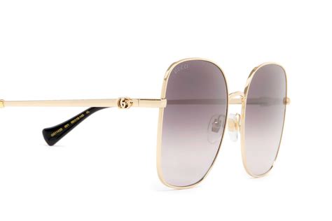 Gucci™ GG1143S 001 59 Gold Sunglasses 